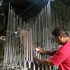 Dominique Martinez working on the 9/11 memorial for the Tampa Firefighters Museum.